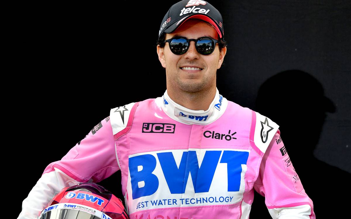 Sergio Perez, Racing Point, talks to the press