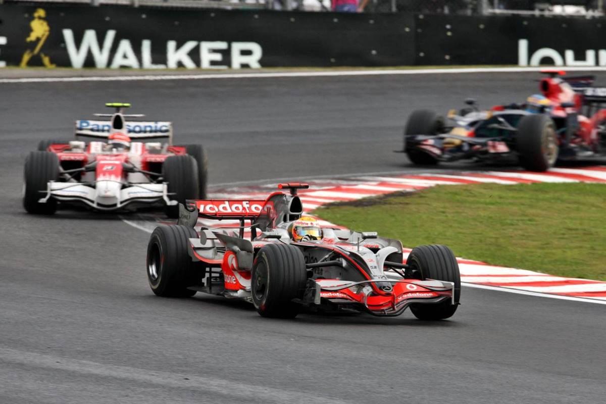Lewis Hamilton y Timo Glock 